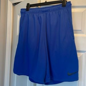 Nike NWOT men’s blue athletic shorts.